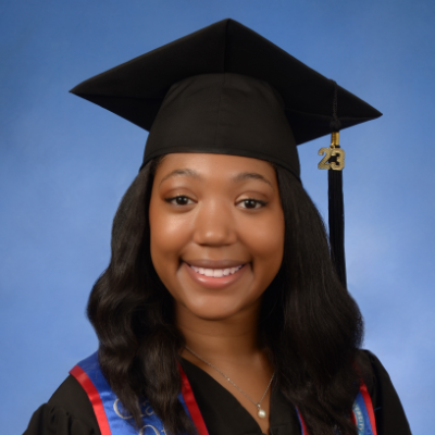 Natalie Riddick cap and gown blue background